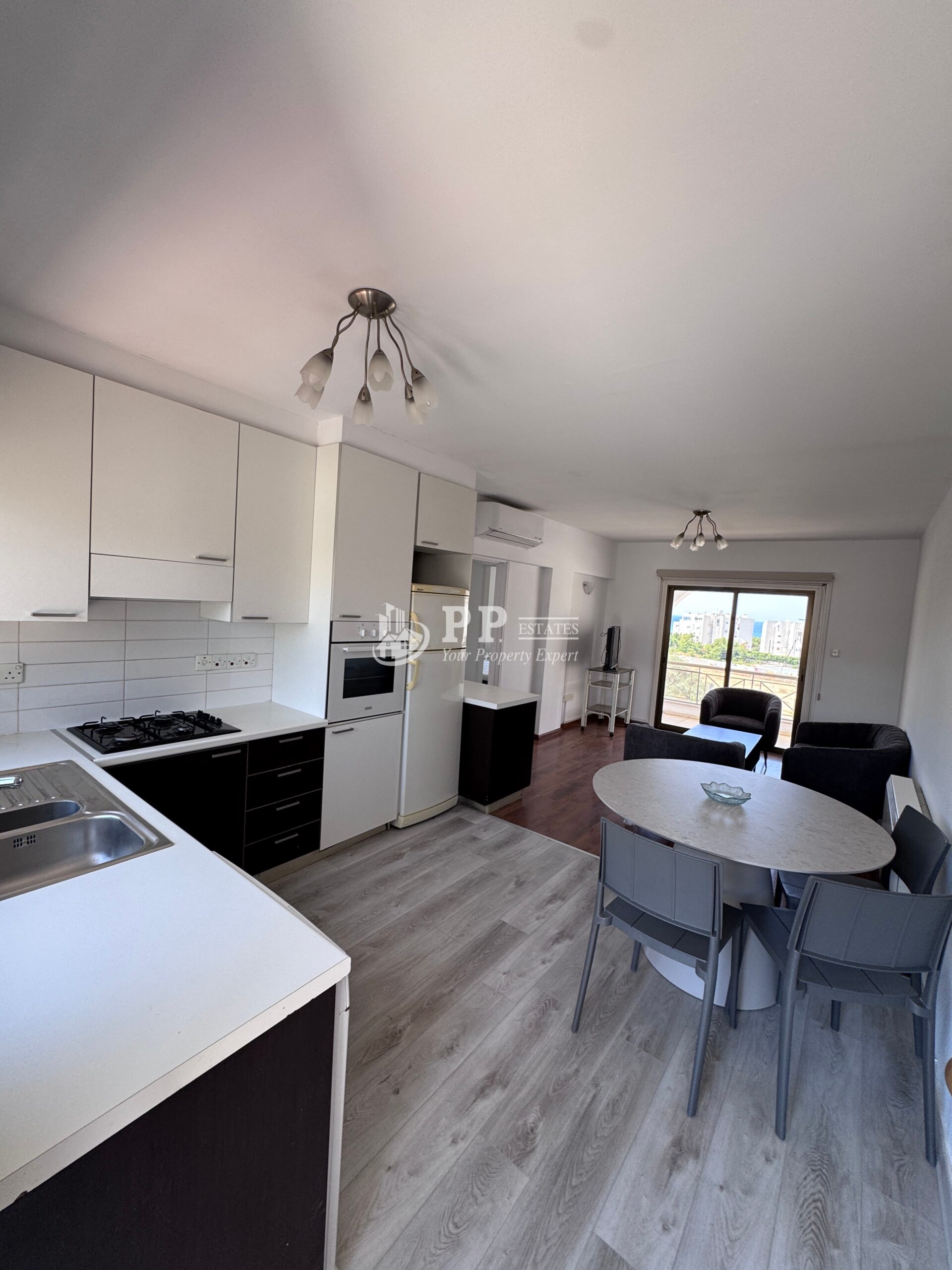 For Rent – 2 bedroom apartment directly opposite the beach with partial sea view in Parekklisia Tourist Area, Limassol